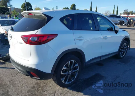 2016 Mazda Cx-5 Grand Touring z USA, uszkodzony, nr VIN JM3KE2DY3G0862670